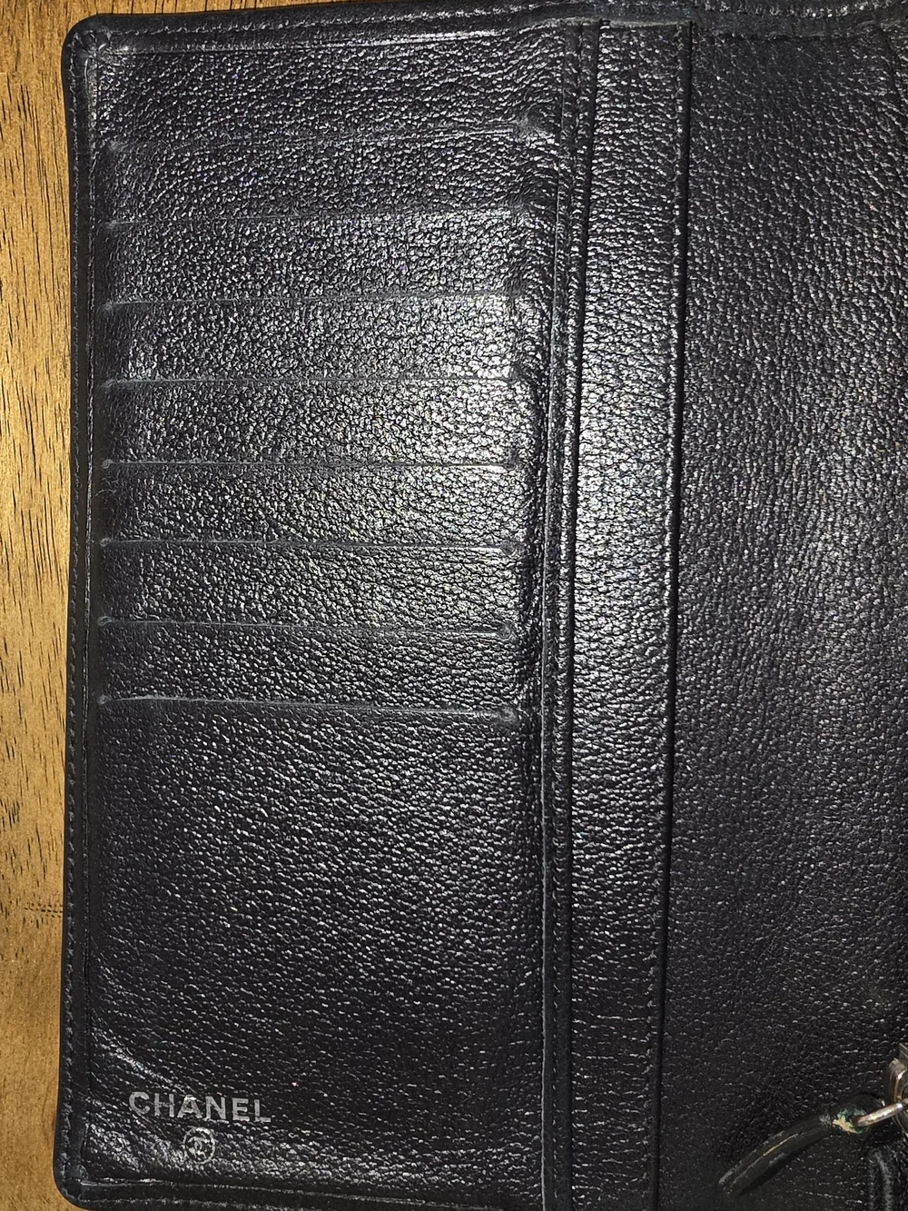 CHANEL Black Lambskin Leather Billfold Camellia Floral Accent With CC Emblem